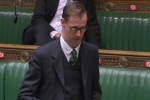 Tom Randall MP talking in Parliament