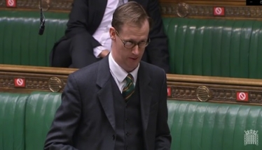 Tom Randall MP talking in Parliament