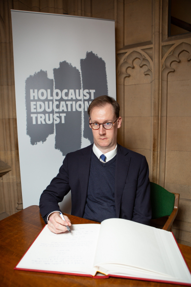 Tom Randall MP signs Holocaust Educational Trust Book of Commitment  